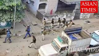 CitizenshipAct2019 प्रदर्शनकारियों के आड़ में वाहनों को तोड़ते दिखे पुलिस