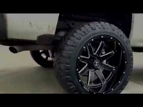2014 Chevy Silverado 7" lift Hostile Alpha 22x12 Wheels