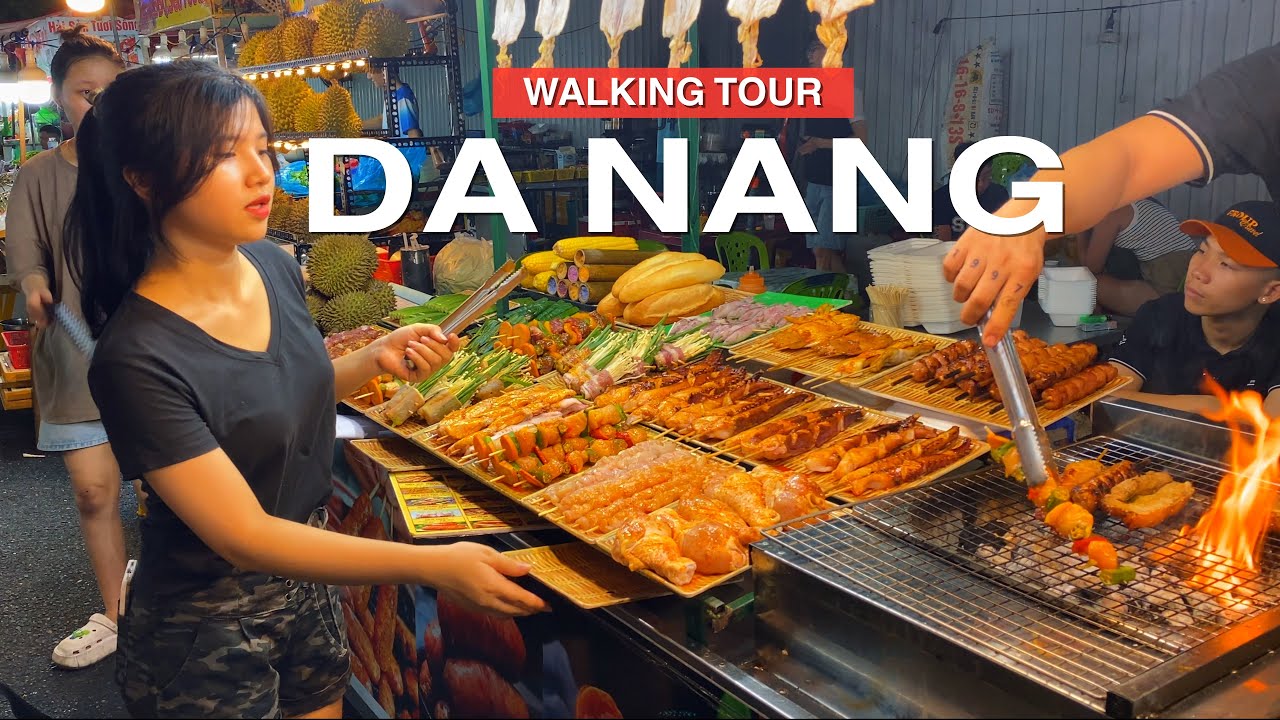 Experience the vibrant atmosphere of a walking tour through Son Tra Night Market, filled with lively stalls and local delicacies.