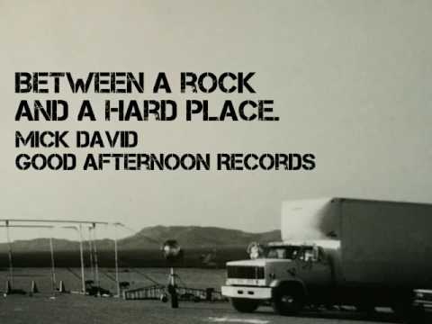BETWEEN A ROCK,AND A HARD PLACE.Mick David.Good Afternoon Records.