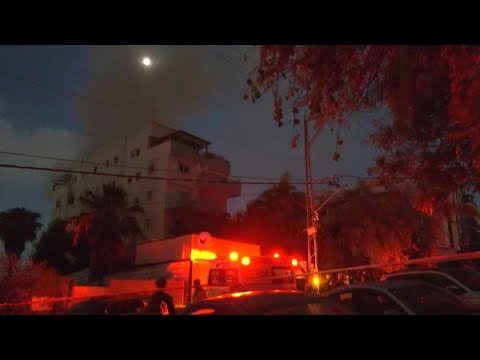Smoke rises from site of Iranian strike in central Israel | AFP