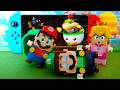Lego Mario Enters The Nintendo Switch To Retrieve The Materials From Behind The Little Bowser Mario