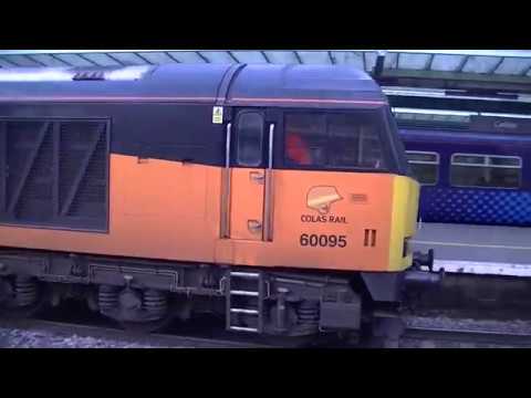 60095 runs through Carlisle with a log train. 9-2-16.