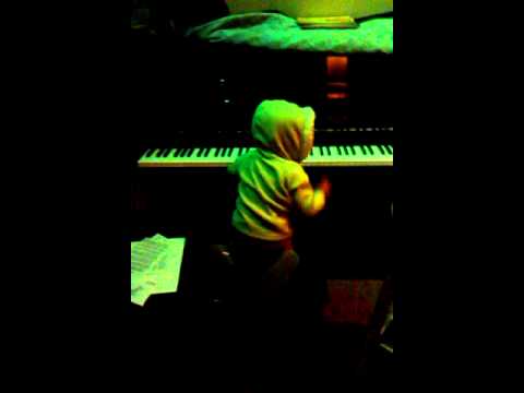 18 month old baby Viktoria, plays variation on Stravinsky piano work, but can not concentrate :)