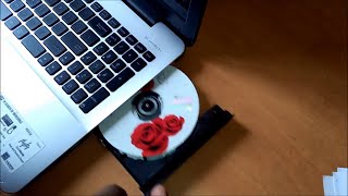 How to insert DVD on ASUS Laptop