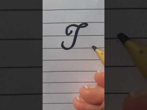 How to write T letter in Cursive Writing.