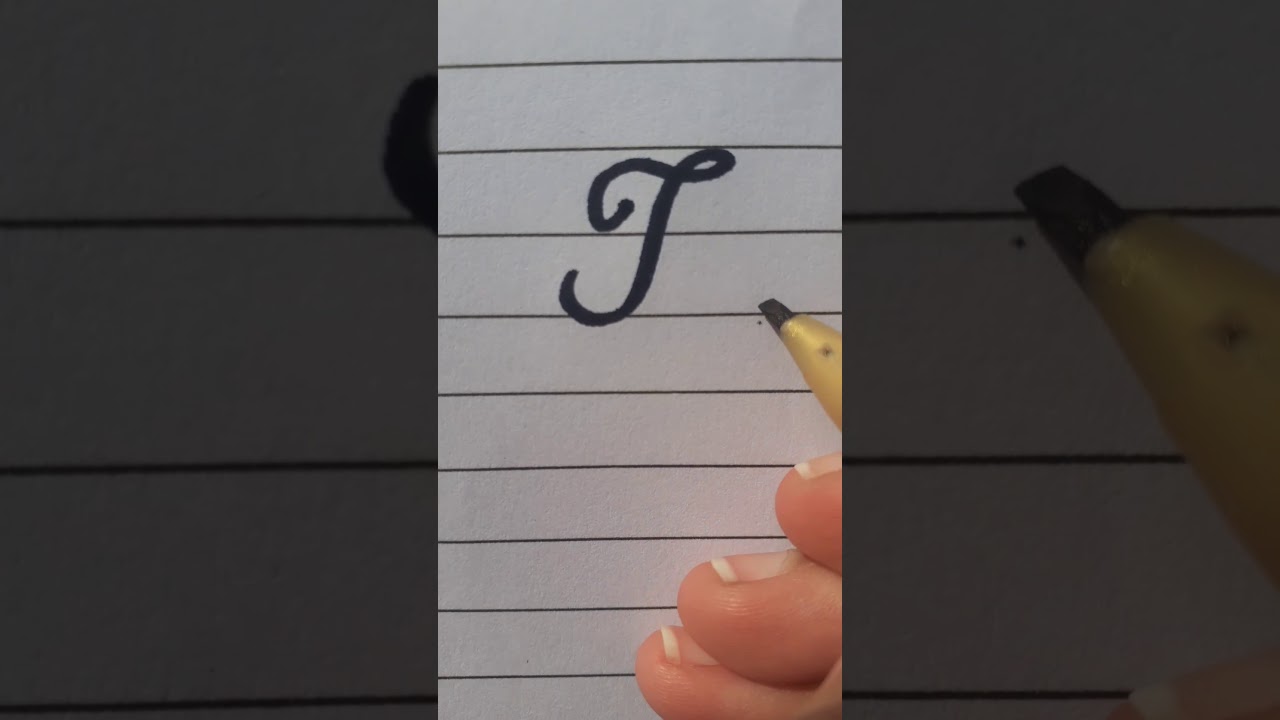 How to write T letter in Cursive Writing.