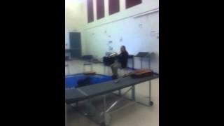 Music teacher playing the trumpet part 2