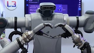 Tayvanlı şirket yeni elektrikli araç ve kahve yapan insansı bir robot tanıttı
