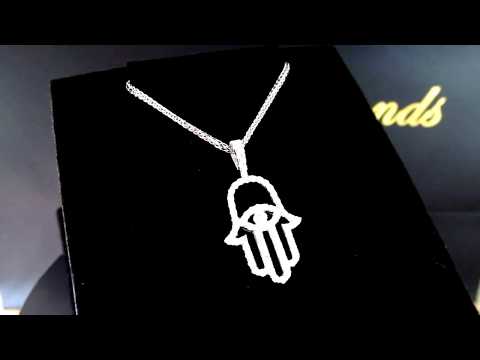 A video of Luxurious Solid Gold Hamsa Pendant with 66 Natural Diamonds