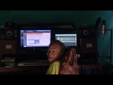 PAK BUDI JOLONG SEDANG MENCIPTAKAN LAGU