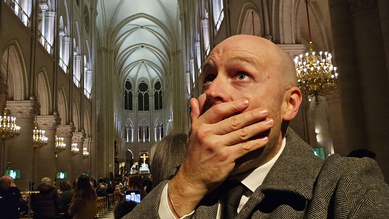 A traveler embarks on an exploration of the majestic Notre-Dame Cathedral.