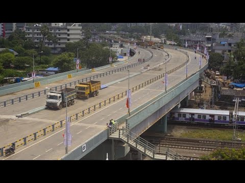 Crossing flyover express train #railtrack #indianrailways #railwaycontent #highspeedtrain 
