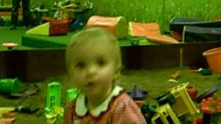 Oceanna Rose playing in the sand box at NW Kids Club