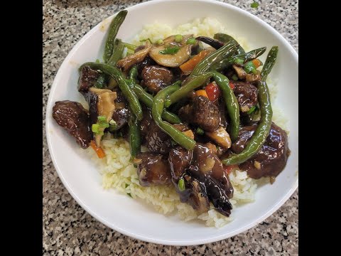 Mongolian beef with stir-fried shitake mushrooms and vegetables