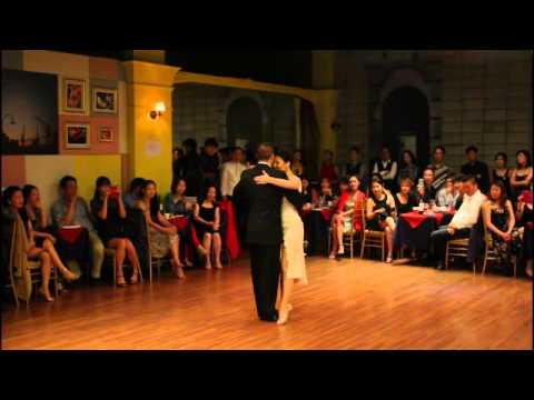  Cristina Sosa  and  Daniel Nacucchio  are  dancing  to  a  tango
