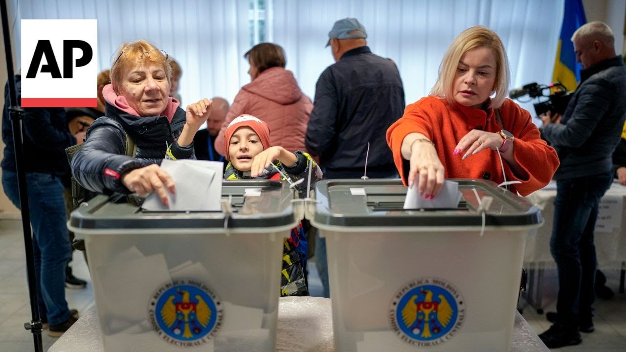 Moldovans cast ballots in two key votes