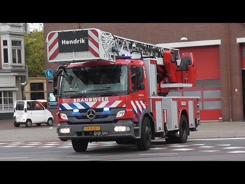 PRIO 1 ASH en ALH met Spoed naar een Woningbrand aan de Spuistraat in Amsterdam