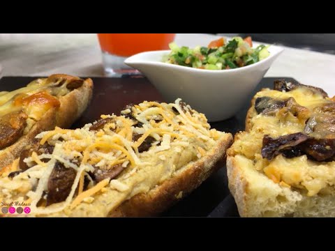 Molletes de hummus con pico de gallo