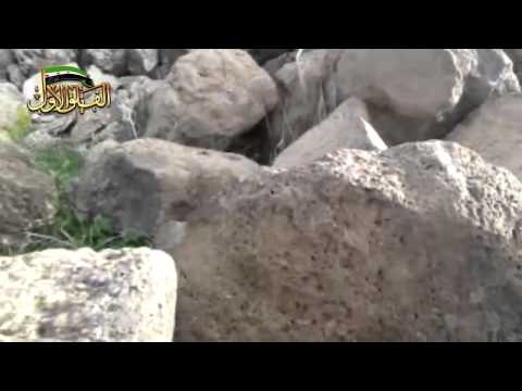 اشتباكات بين عناصر لواء توحيد الأمة وقوات النظام اثناء اقتحام تل غرين في ريف درعا