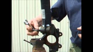 Mazda3-How to separate a shocker/strut from a steering knuckle