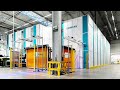 AutoStore mit vollautomatischem KLT-Wareneingang | Siemens Rastatt | Deutsch