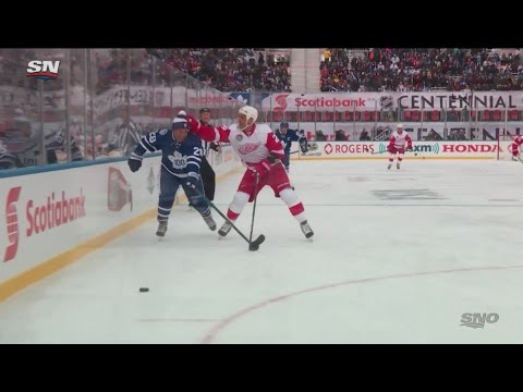 Chris Chelios grabs Tie Domi's Toque and throws it at him