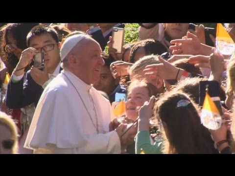 Pope greets crowd outsidie Apostolic Nunciature