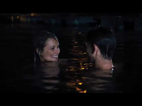 Piranha 3DD official trailer still: waterpark grand opening with crowds, a wink at the party-forward soundtrack