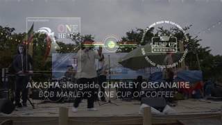 Bob Marley's One Cup Of Coffee by Akasha alongside Charley Organaire