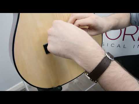 How to replace a string on a classical guitar