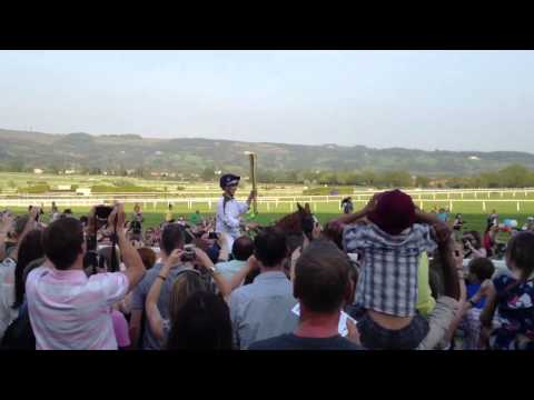 Zara Phillips carry the Olympic Torch Cheltenham Race Cours
