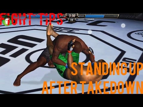 EA SPORTS UFC Mobile - Fight Tips: Standing up after Takedown
