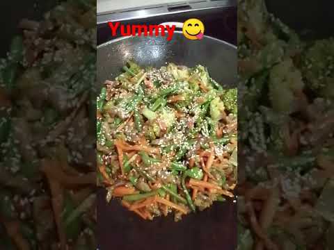 Beef Steak with stir fry veggies in sesame oil and...