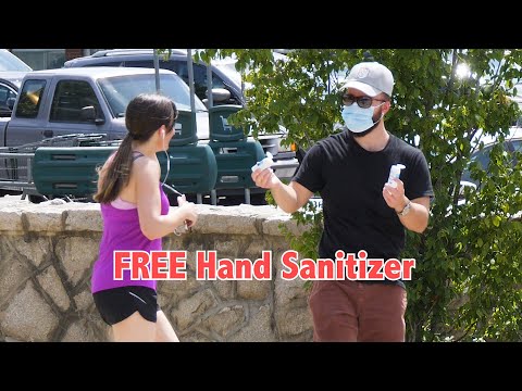 Giving Out Free Hand Sanitizer