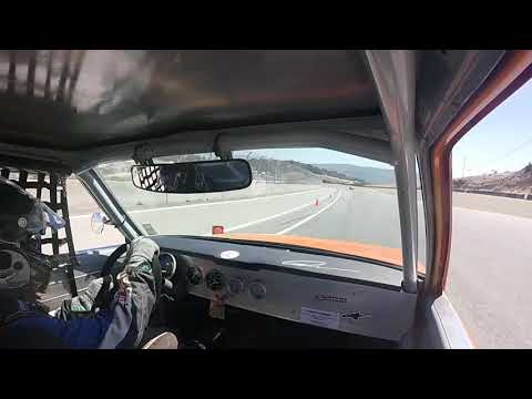 Taz Harvey jukes a Lotus at Laguna Seca