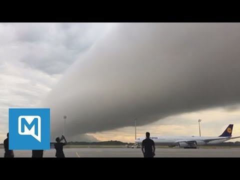 Faszinierende Bilder: Riesige Wolkenschicht rollt über Münchner Flughafen