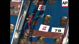 Laser-powered robot climbs cable in space science competition