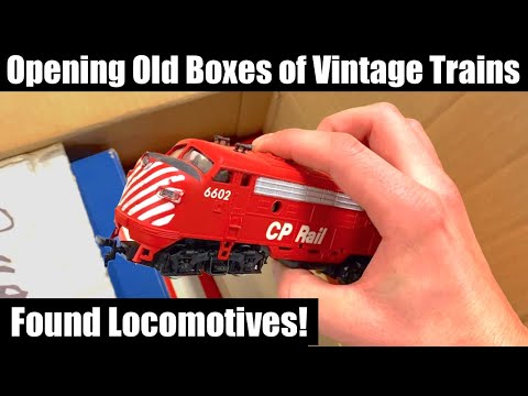 Opening Old Boxes of Vintage Model Trains at a Train Store