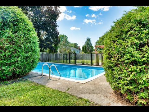 Bungalow for sale in Candiac Quebec - Fully renovated 3+-1 BDR- Bauhaus Realty