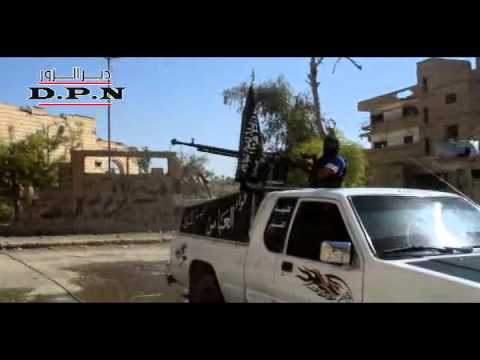 استهداف تحصينات قناص قوات النظام في حي الموظفين في دير الزور  بواسطة رشاش دوشكا من قبل كتيبة المنذر التابعة للواء العباس