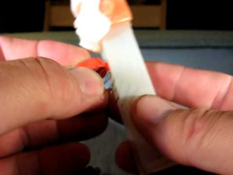 how to remove a 3.9 Pez dispenser button