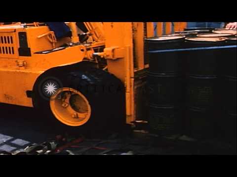 Unrep of USS Constellation - Cargo net supplies on high lines to elevator of ship...HD Stock Footage