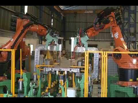 BUS CABIN FLOOR TO LADDER ROBOT WELDING ON SHUTTLE CONVEYOR