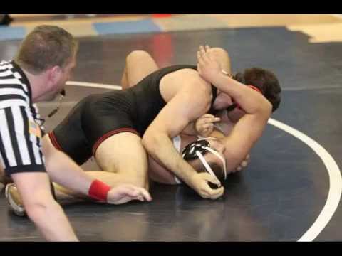 Emmanuel "Manos" Attaliadis wrestling with the Rams