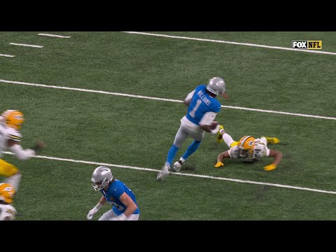Jameson Williams spins out of a tackle and takes it the house