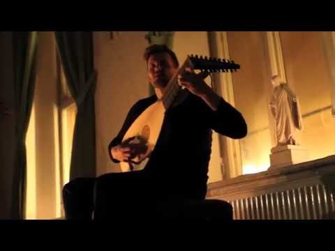 Jonas Nordberg playing the theorbo/lute at Stockholm Early Music Festival