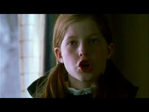 Snow Day (2000) trailer still: kids launching a snowball barrage as plows loom