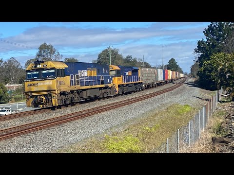 Pacific National’s NR113 and LDP002 guide a late running 5MB1 through Greenbank 23/7/22