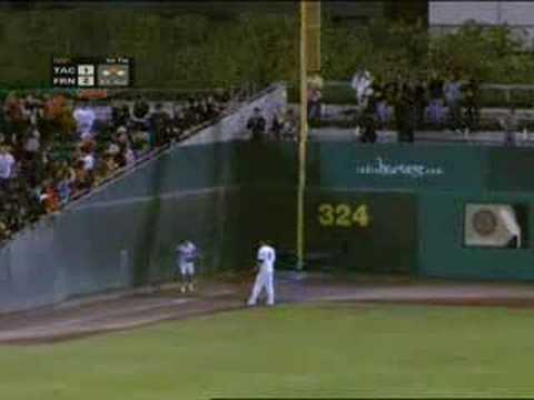 Ball girl's amazing wall-climbing catch...